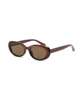 atmos Pink Oval Sunglass with pink frames and oval shape, from Japan