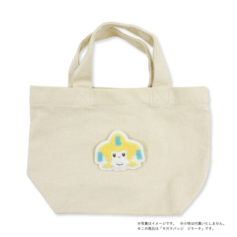 Official Pokemon Center Japan licensed Jirachi pin with packaging from Japan