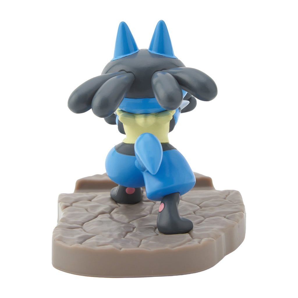 Lucario figure on smartphone stand, showcasing Japanese design
