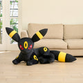Plush life-size Blackie lying down
