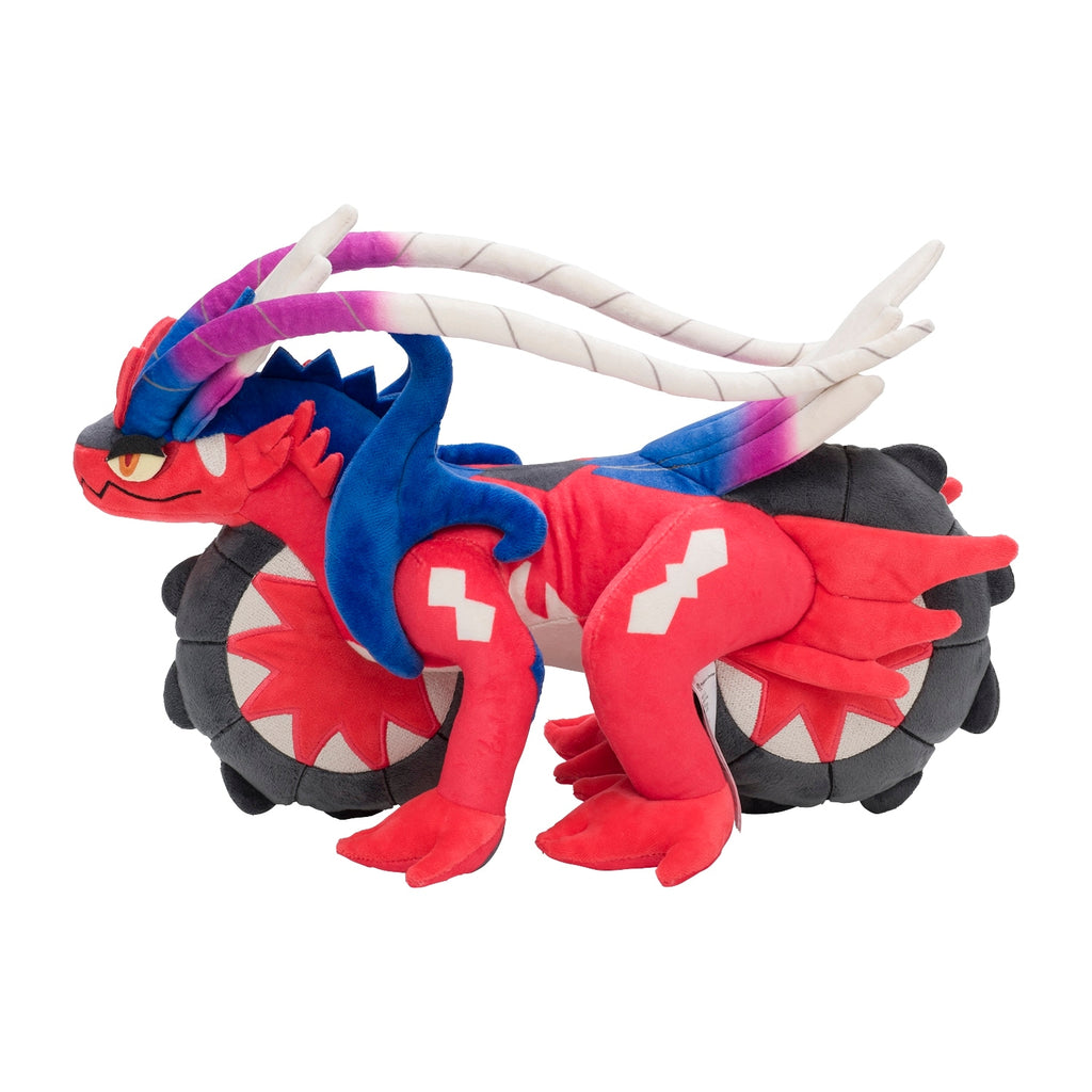 Pokemon Koraidon plushie, sitting pose with Japan packaging