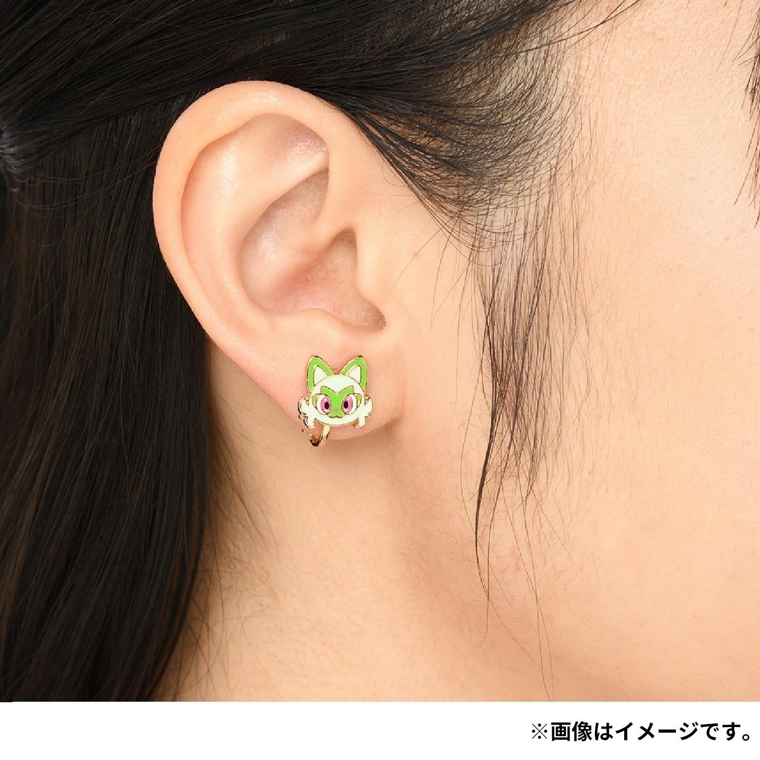 Pokémon earrings packaging with Japanese text and authentic logo