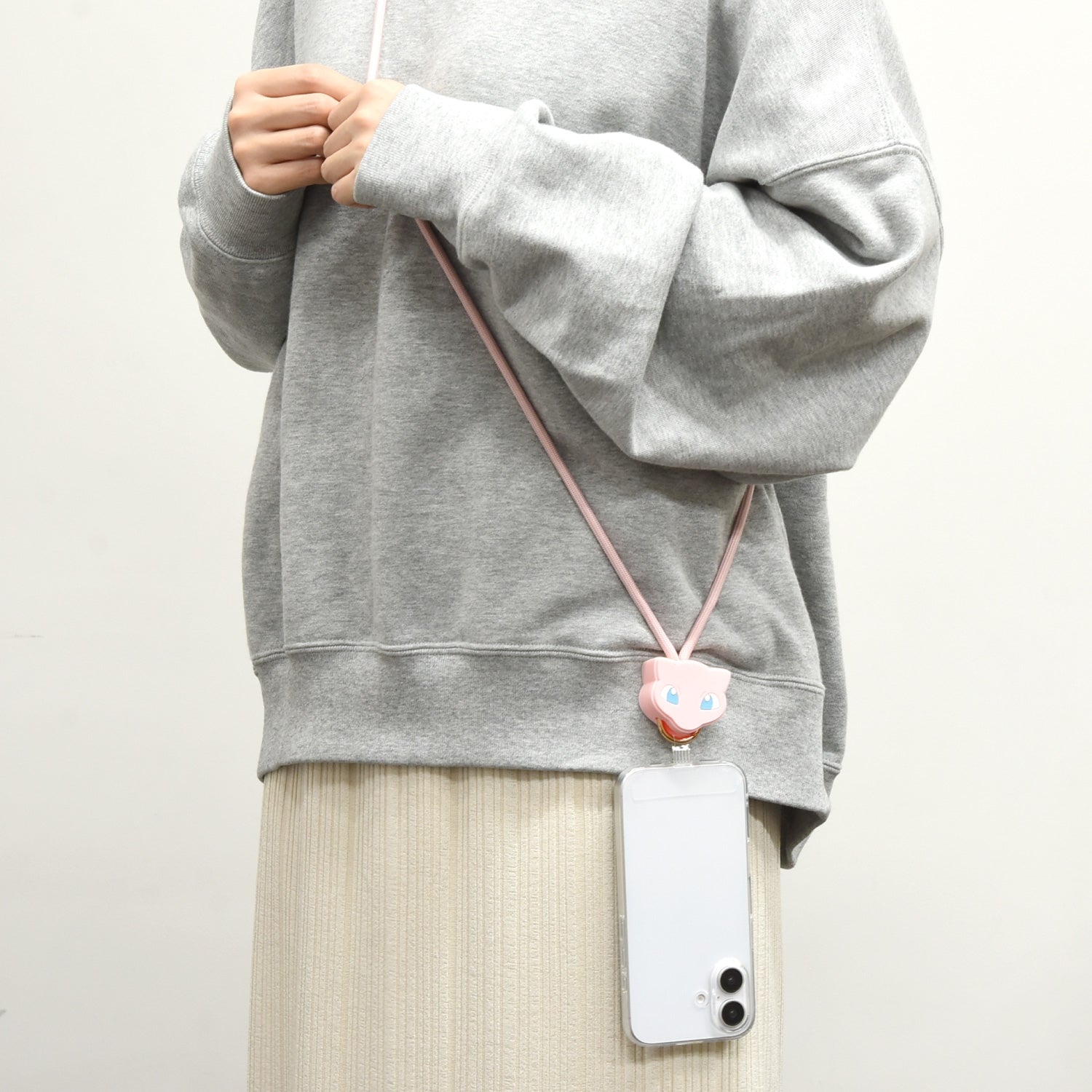 Close-up of Mew Multi Ring Plus Mascot Strap, showcasing its vibrant colors and details from Japan