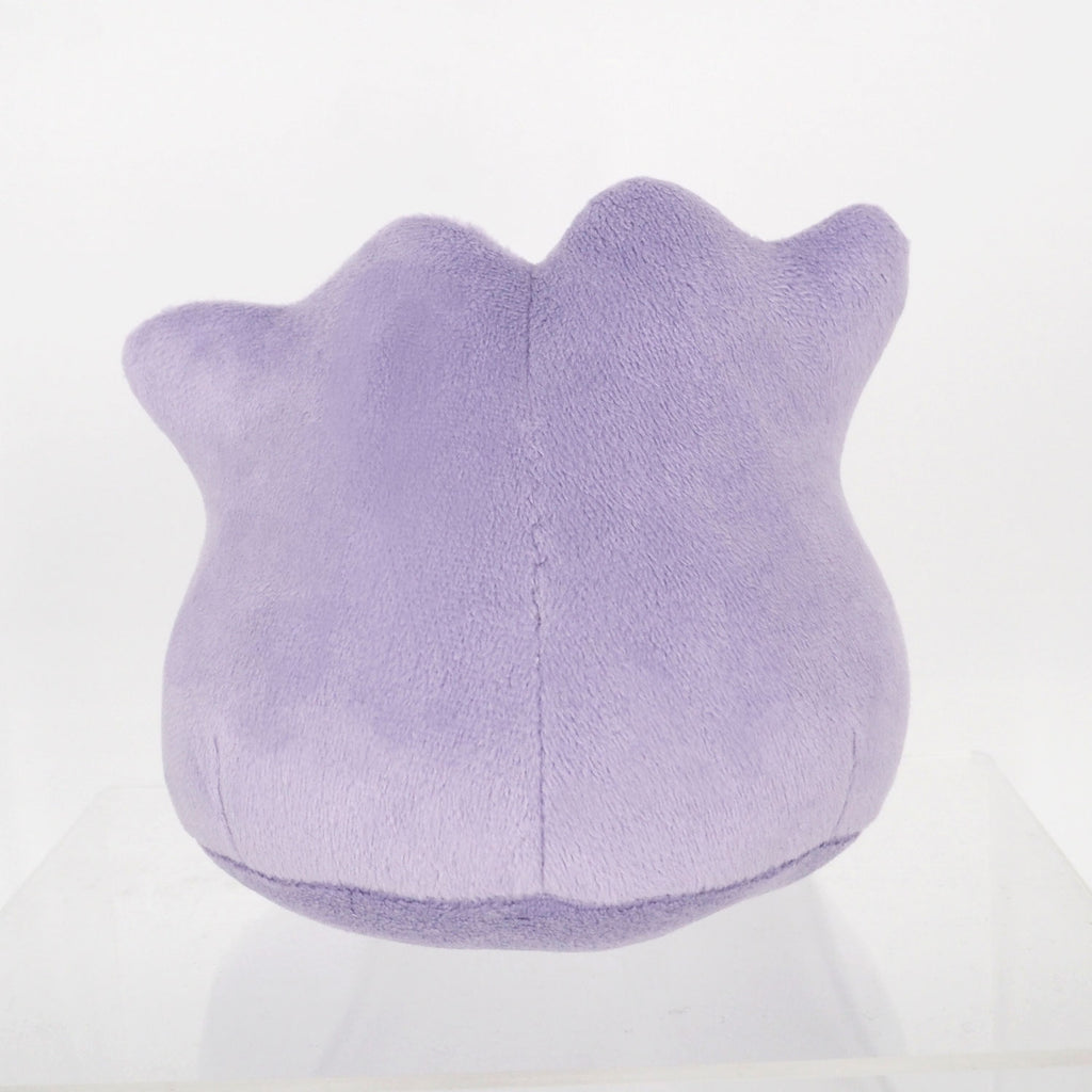 Metamon plush toy, side view showing soft texture from Japan