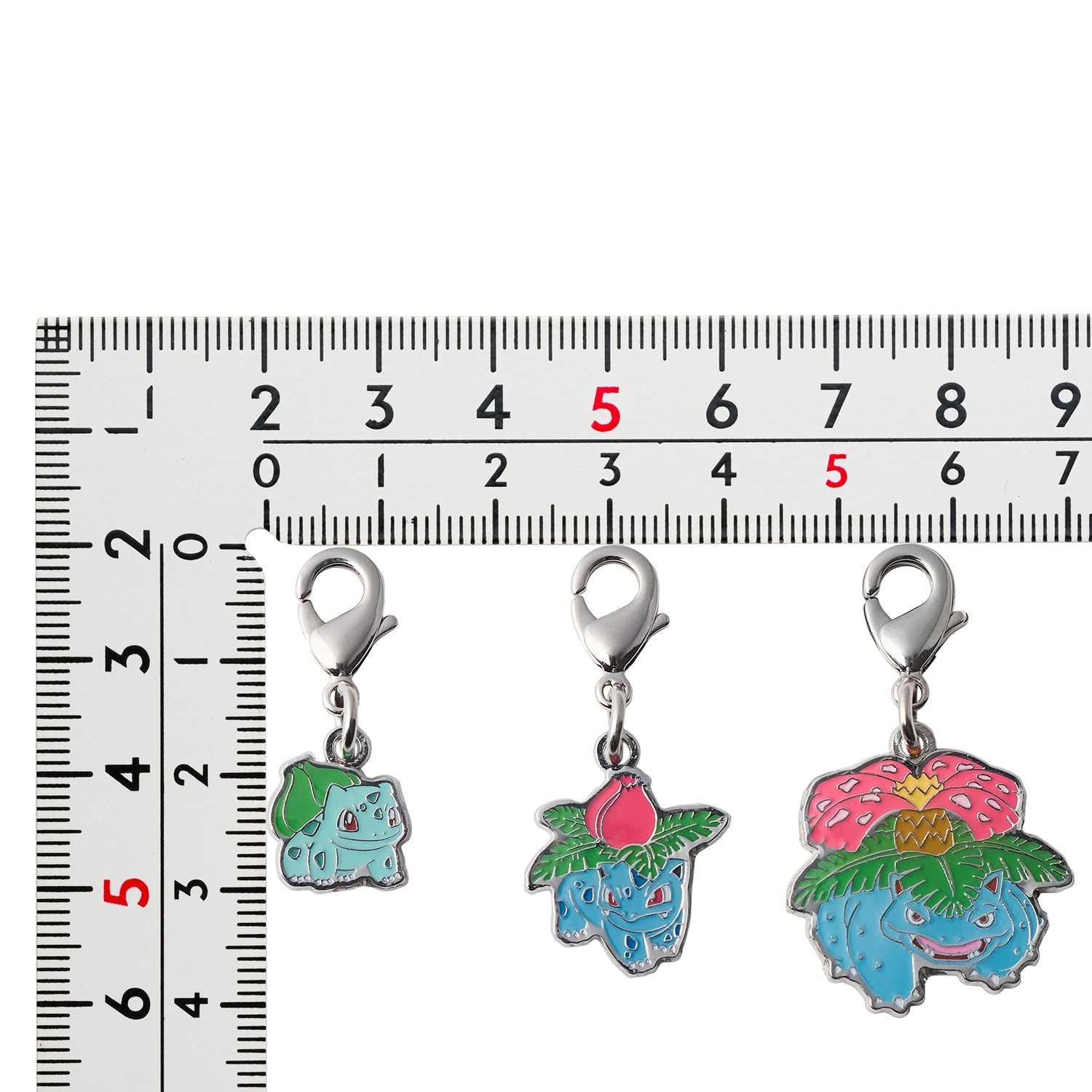 Pokemon Metal Charm 002 and 003 from Japan, showcasing intricate details and authentic packaging