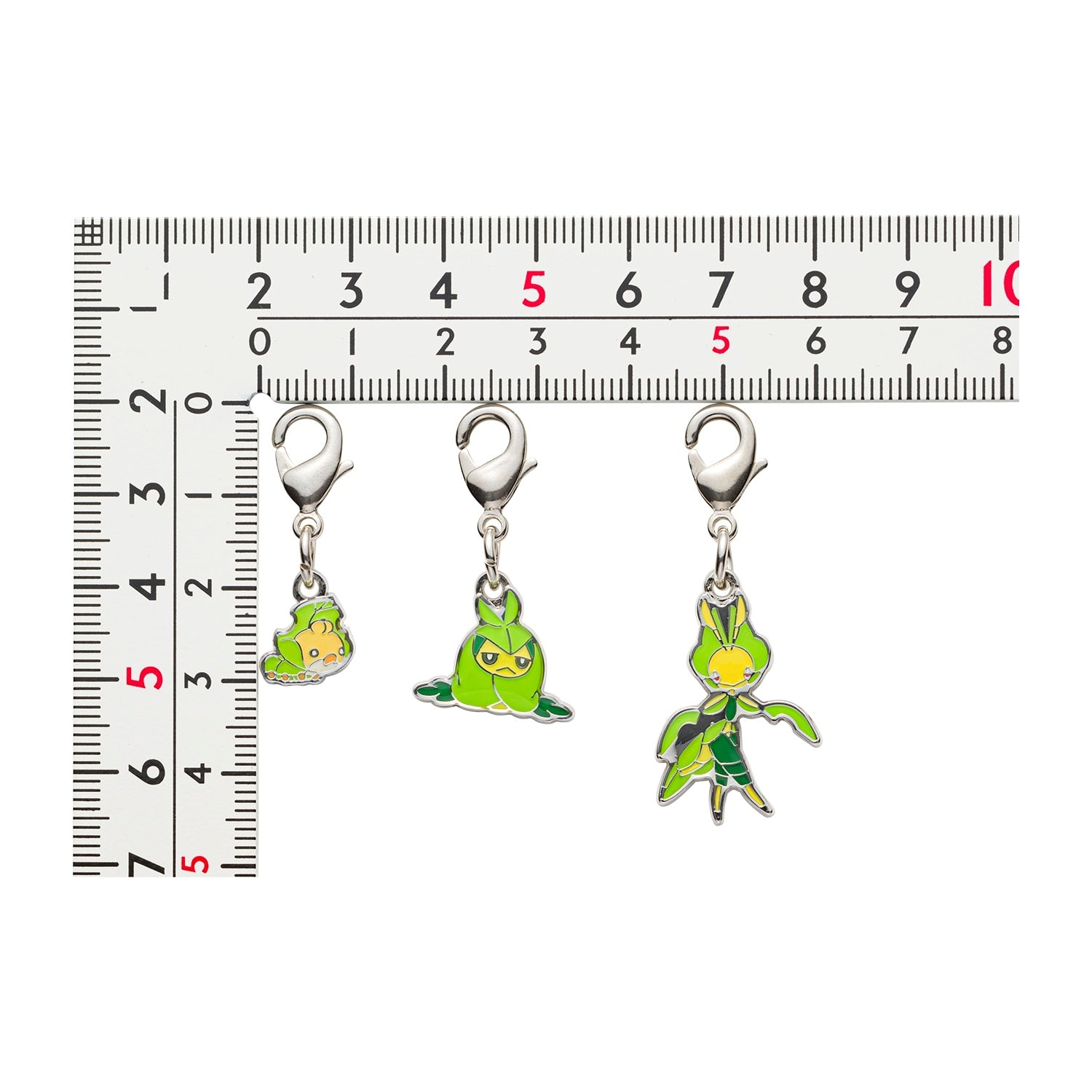 Close-up of Pokemon Center Japan Metal Charms 540-542, showcasing collector-grade quality from Japan