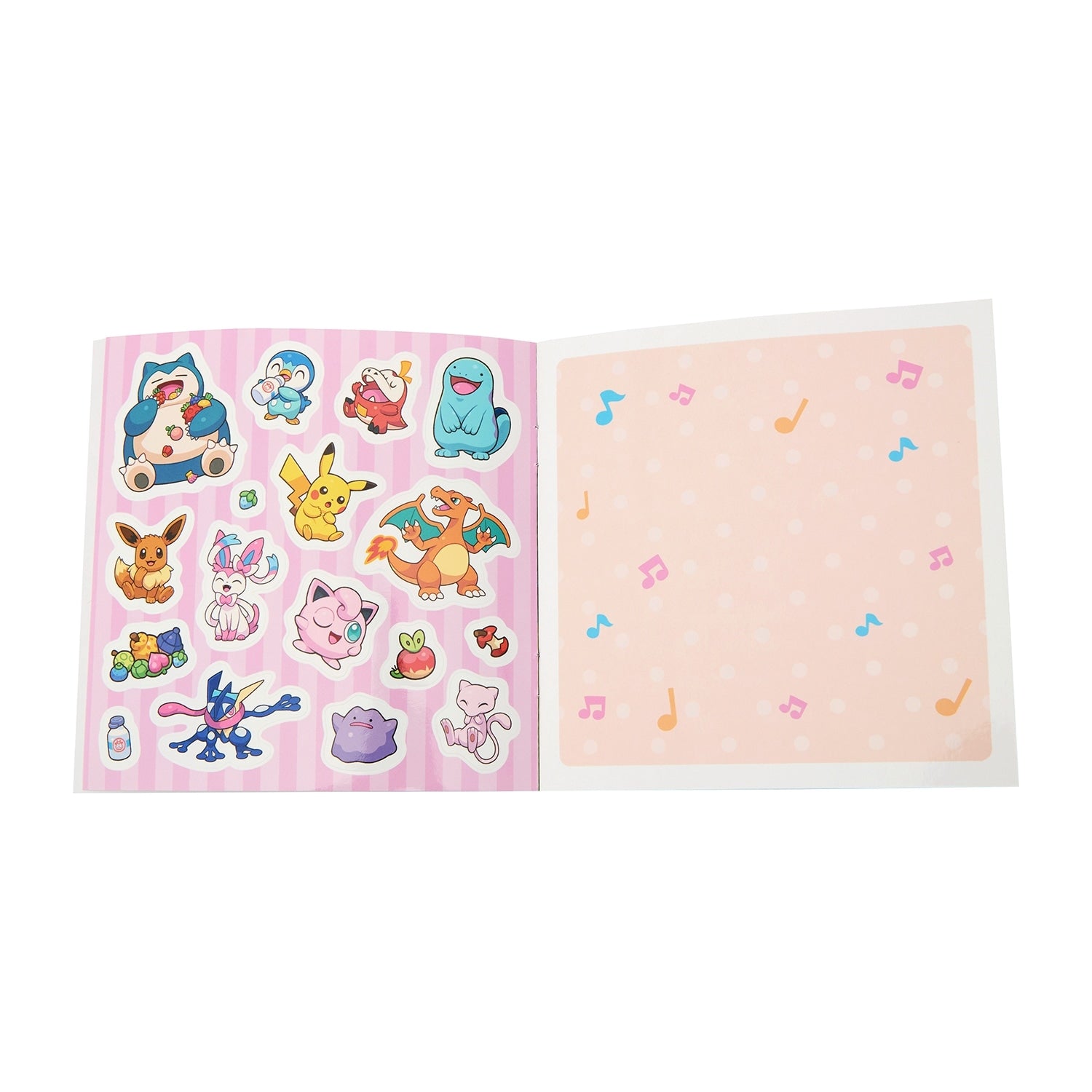 Close-up of POKÉMON SCHOOL sticker book pages with Japanese text and anime-style art