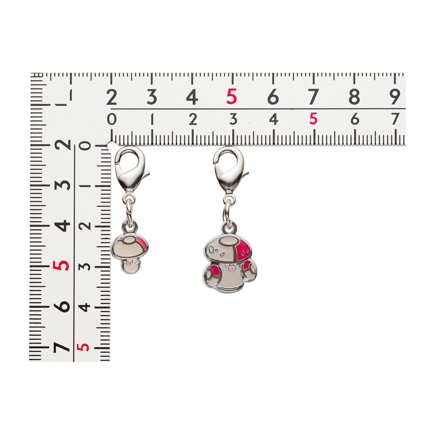 Authentic Pokemon Metal Charm National Encyclopedia 590/591 from Japan, with official licensing and collector-grade quality