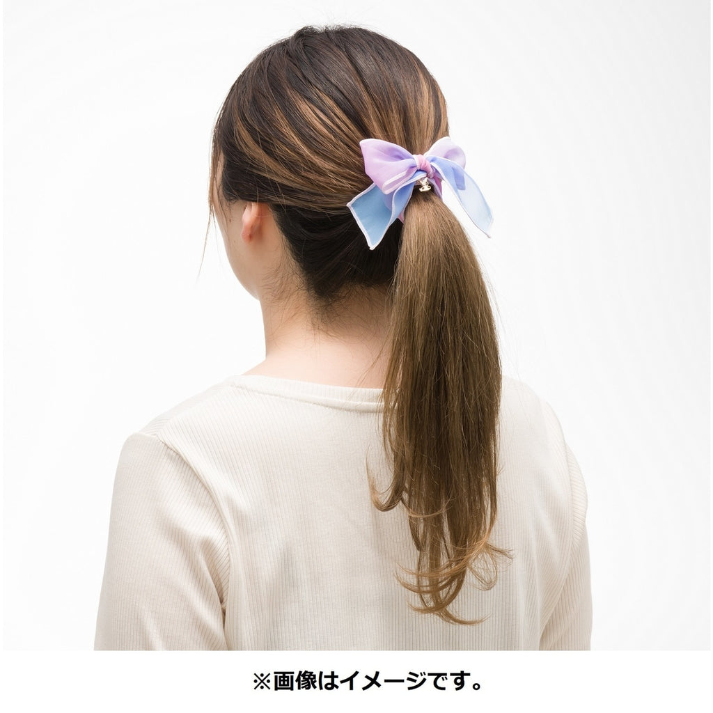 Pokémon hair tie accessory on a model, showcasing Japanese fashion