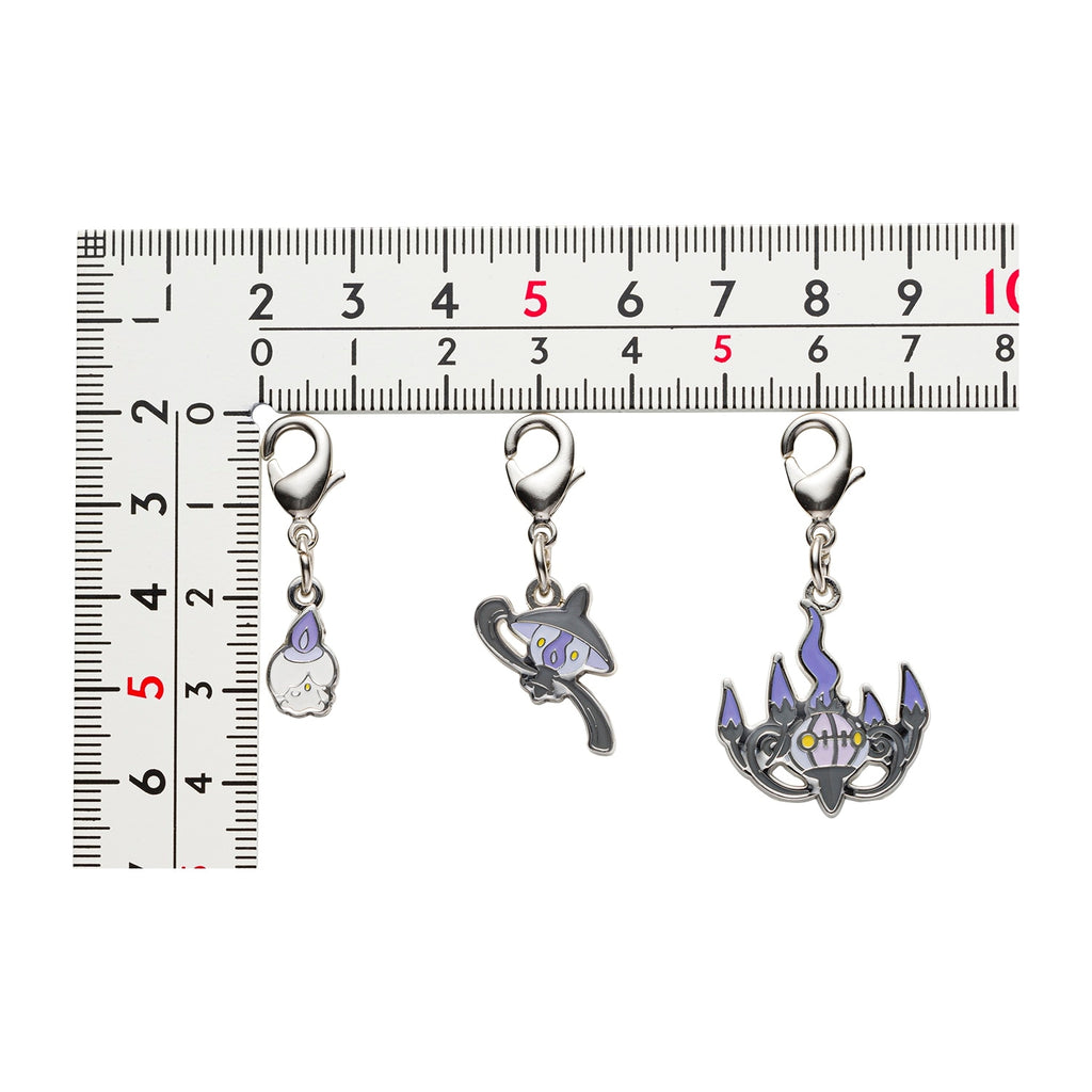 Pokemon Metal Charm 608 and 609 from Japan, showcasing detailed metalwork