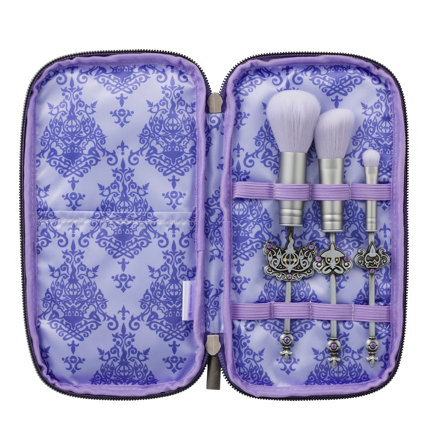 Close-up of Pokemon makeup brushes with unique handle designs from Japan