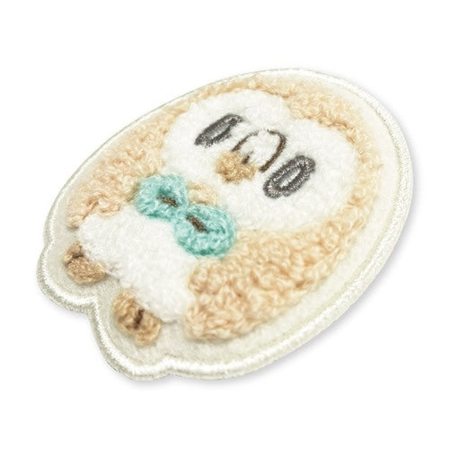 Back of Rowlet enamel pin with official Pokemon Center Japan packaging from Japan