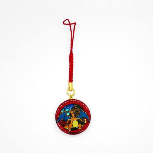 Close-up of Charizard Netsuke, showcasing Japanese craftsmanship from Pokemon Center