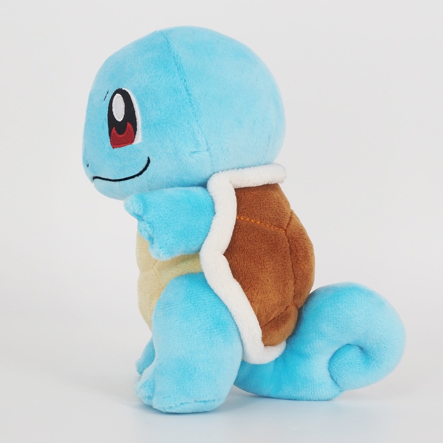 Squirtle plushie with water gun, imported from Japan for Pokemon fans