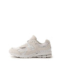 New Balance U2002DXA sneakers with unique design from Japan