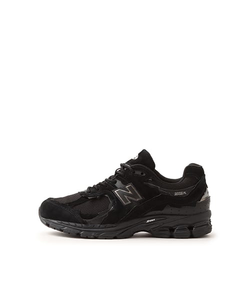 New Balance U2002DXB sneakers with unique design details from Japan